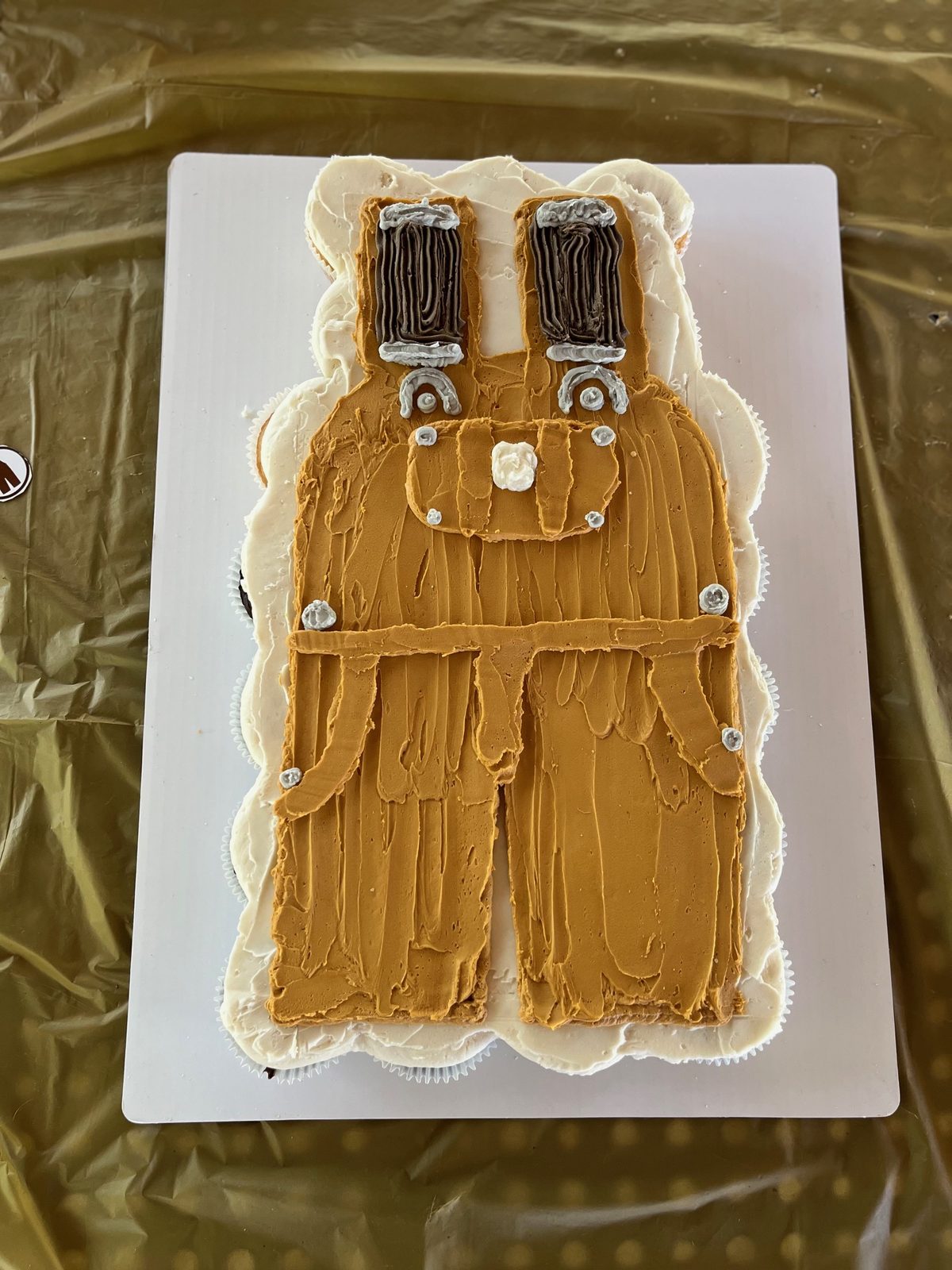 Novelty cake shaped like denim overalls made by Bipity Bopity Cakes, Lodi CA bakery